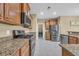 Well-equipped kitchen with stainless steel appliances, granite countertops, and stylish cabinetry at 1139 Parish Way, Myrtle Beach, SC 29577