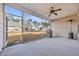 Relaxing screened-in back patio with a ceiling fan, grill, and heater offering a comfortable outdoor living space at 1139 Parish Way, Myrtle Beach, SC 29577