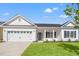 Charming single story home with a well-manicured lawn, a two car garage, and inviting curb appeal at 1209 Cypress Shoal Dr., Conway, SC 29526
