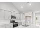 Stylish kitchen featuring white cabinetry, stainless steel appliances, and bright countertops at 1209 Cypress Shoal Dr., Conway, SC 29526