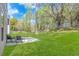 Spacious backyard features a well-maintained lawn and patio seating area at 210 26Th Ave. S, Myrtle Beach, SC 29577