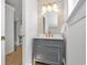 Elegant bathroom with a stylish vanity, decorative mirror, and modern fixtures, creating a luxurious feel at 210 26Th Ave. S, Myrtle Beach, SC 29577