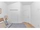 Bright bedroom with light wood laminate floors, closet with white doors, and white trim at 210 26Th Ave. S, Myrtle Beach, SC 29577