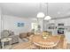 Open living space with kitchen, dining, and seating areas, featuring lots of natural light and modern finishes at 210 26Th Ave. S, Myrtle Beach, SC 29577