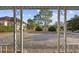 View from the porch shows a spacious backyard with mature trees at 4502 Eyerly St., North Myrtle Beach, SC 29582