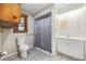 Bathroom with toilet, shower, and vanity with under-sink storage at 4502 Eyerly St., North Myrtle Beach, SC 29582