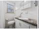 Clean bathroom with single sink vanity, shower, and toilet at 4502 Eyerly St., North Myrtle Beach, SC 29582