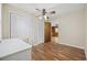 Bedroom with laminate wood floor, built-in closet and view to another room at 4502 Eyerly St., North Myrtle Beach, SC 29582