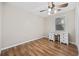 Simple bedroom with laminate wood floor, a desk and chair at 4502 Eyerly St., North Myrtle Beach, SC 29582