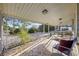 Front porch with tiled floor, seating area, and view of yard at 4502 Eyerly St., North Myrtle Beach, SC 29582