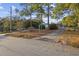 Home with a long driveway and mature trees at 4502 Eyerly St., North Myrtle Beach, SC 29582