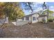 Charming yellow house with blue trim and a landscaped yard at 4502 Eyerly St., North Myrtle Beach, SC 29582