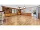 Living room with hardwood floors, built-in shelving, and access to the back porch at 4502 Eyerly St., North Myrtle Beach, SC 29582