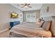Comfortable bedroom with two beds, a TV, and bright furnishings at 613 Lee Ave., Murrells Inlet, SC 29576