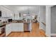 Open kitchen with stainless appliances and hardwood floors at 613 Lee Ave., Murrells Inlet, SC 29576