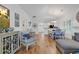 Well-designed living space with hardwood floors, a kitchen/dining area, and coastal-themed decor at 613 Lee Ave., Murrells Inlet, SC 29576