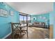 Living room with ocean view and wood-look flooring at 6804 N Ocean Blvd. # 1537, Myrtle Beach, SC 29572