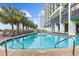Large resort pool with surrounding lounge chairs at 6804 N Ocean Blvd. # 1537, Myrtle Beach, SC 29572