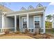 Charming front porch offers a pair of rocking chairs and plenty of curb appeal at 7246 Sarteano Dr., Myrtle Beach, SC 29572