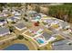 Aerial view of home featuring backyard pool, fenced yard, and suburban neighborhood at 1004 Millsite Dr., Conway, SC 29526
