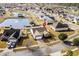 Aerial view of home featuring well-maintained yard, a pond, and suburban neighborhood at 1004 Millsite Dr., Conway, SC 29526