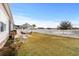 Expansive backyard with a manicured lawn, patio area, and white picket fence at 1004 Millsite Dr., Conway, SC 29526