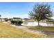 Scenic view of the community pond with a fountain, walking path, and lush landscaping at 1004 Millsite Dr., Conway, SC 29526