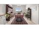 Cozy dining room featuring a window view, a decorative rug and traditional wooden furniture at 1004 Millsite Dr., Conway, SC 29526