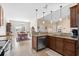 Spacious kitchen featuring granite countertops, stainless steel appliances, and a view of the dining area at 1004 Millsite Dr., Conway, SC 29526