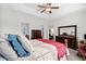 Inviting main bedroom featuring two dressers, ensuite access, tray ceiling, and comfortable furnishings at 1004 Millsite Dr., Conway, SC 29526
