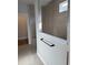 Modern bathroom with a tiled shower featuring a bench and updated fixtures at 1240 Winding Creek Way, Myrtle Beach, SC 29588