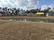 Scenic view of the pond and the surrounding homes in the neighborhood at 1240 Winding Creek Way, Myrtle Beach, SC 29588