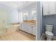 Bathroom featuring double sink vanity, soaking tub, and glass shower enclosure at 126 Pickering Dr., Murrells Inlet, SC 29576