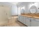 Bathroom featuring double sink vanity, soaking tub, and glass shower enclosure at 126 Pickering Dr., Murrells Inlet, SC 29576