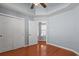 Neutral bedroom with hardwood floors and open closet at 126 Pickering Dr., Murrells Inlet, SC 29576