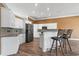 Modern kitchen featuring granite countertops, stainless steel appliances, and a breakfast bar at 126 Pickering Dr., Murrells Inlet, SC 29576
