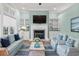 Cozy living room with a fireplace, comfortable seating, and stylish decor at 126 Pickering Dr., Murrells Inlet, SC 29576
