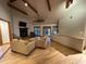 Inviting living room with hardwood floors, beamed ceilings, fireplace and comfortable furnishings at 187 Alston Rd., Pawleys Island, SC 29585