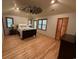 Spacious bedroom with hardwood floors, a ceiling fan, and large closets at 187 Alston Rd., Pawleys Island, SC 29585