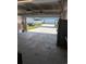 Garage Interior featuring view to driveway and neighborhood, storage space and organization at 2023 Singing Palm Loop, Little River, SC 29566