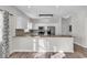Modern kitchen with granite countertops and stainless steel appliances at 3943 Gladiola Ct. # 204, Myrtle Beach, SC 29588