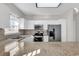 Modern kitchen with granite countertops and stainless steel appliances at 3943 Gladiola Ct. # 204, Myrtle Beach, SC 29588