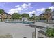 Relaxing kidney-shaped pool with plenty of lounge chairs at 3943 Gladiola Ct. # 204, Myrtle Beach, SC 29588