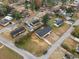 High-angle view of the home surrounded by lush greenery in a serene residential setting at 412 E Melrose St., Mullins, SC 29574