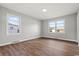 Inviting bedroom filled with natural light, showcasing a calming color palette and sleek floors at 412 E Melrose St., Mullins, SC 29574