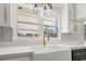 Close-up of kitchen sink with quartz countertops and modern faucet at 412 E Melrose St., Mullins, SC 29574