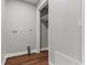 Laundry room with grey walls and wood floors at 412 E Melrose St., Mullins, SC 29574