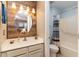 Bathroom with wood accent wall, overhead lighting, and a tub and shower combo at 775 Plantation Dr. # 59, Little River, SC 29566