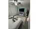 Modern bedroom featuring a bed, accent lighting, a decorative rug, and a fireplace entertainment center at 128 Fulbourn Pl., Myrtle Beach, SC 29579