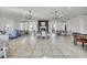 A spacious common area with tables, chairs, and a fireplace for residents to gather and socialize at 128 Fulbourn Pl., Myrtle Beach, SC 29579